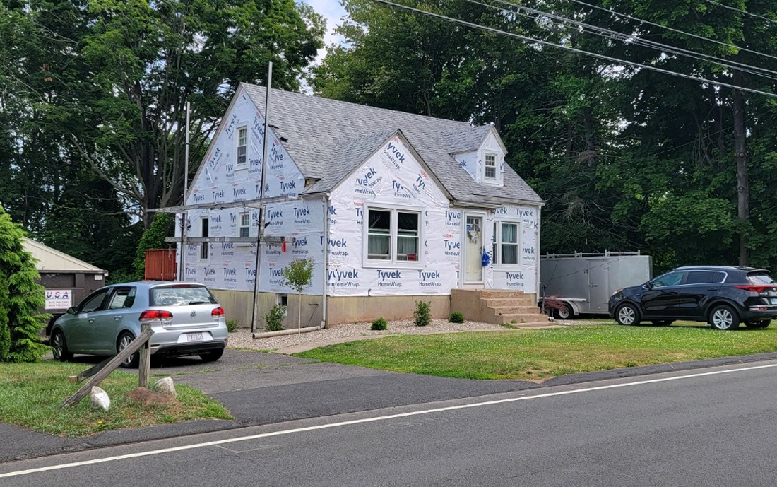 tyvek homewrap on a home in berlin before insulated vinyl siding replacement